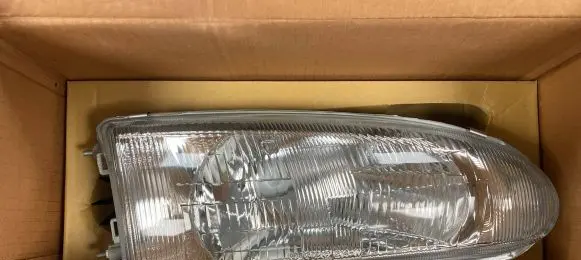 Mitsubishi Colt Headlight/headlamp MB907234