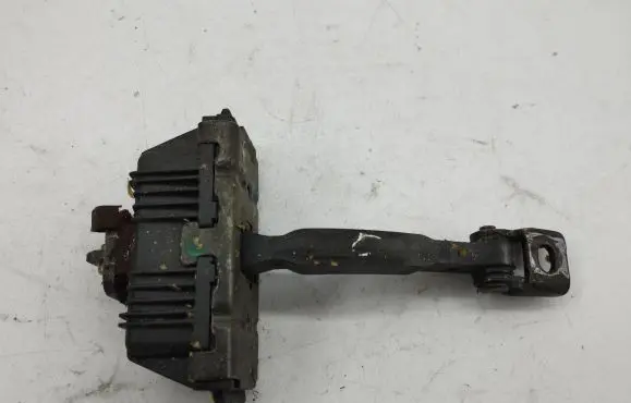 Front door check strap stopper