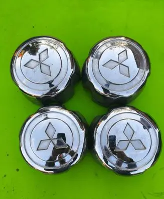 Mitsubishi L200 Original wheel cap MB816581