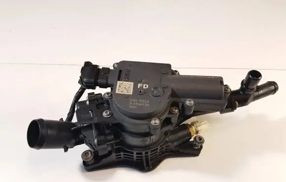 Thermostat/thermostat housing