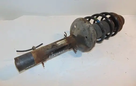 Volkswagen Golf IV Front shock absorber with coil spring 1J0413031S