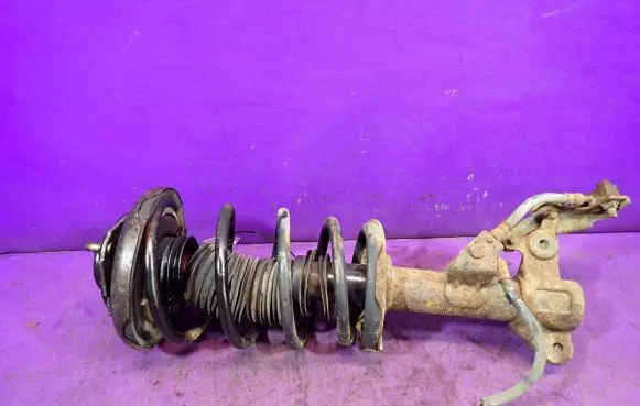 Front shock absorber with coil spring
