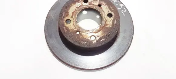 Nissan Almera N16 Rear brake disc neventiliuojamas