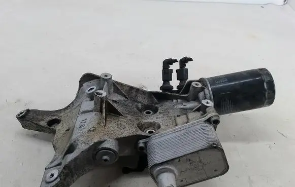 Volkswagen Beetle A5 Oil filter mounting bracket 06J903143AH