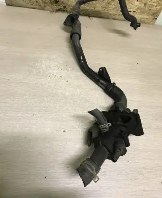 Thermostat/thermostat housing