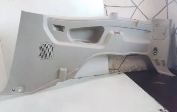 Trunk/boot lower side trim panel