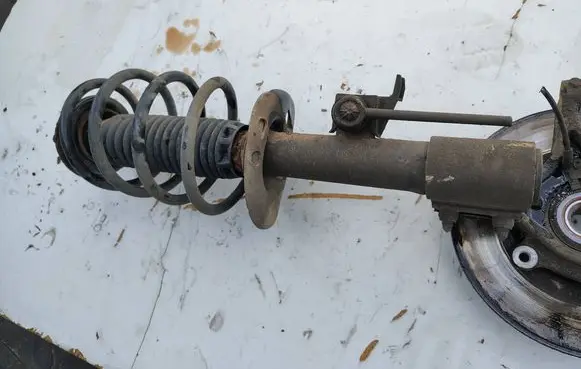 Citroen Berlingo Front shock absorber with coil spring