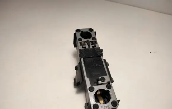 Tail light bulb cover holder