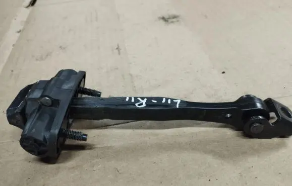 Rear door check strap stopper