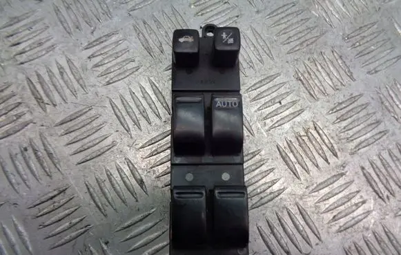 Nissan Primera Front door window switch trim 25401AV660