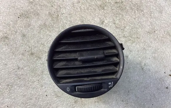 Volkswagen Caddy Dash center air vent grill 2K0819703B