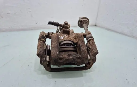Opel Astra J Rear brake caliper 