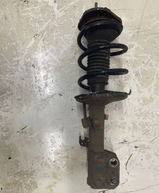 Toyota Avensis T250 Front shock absorber with coil spring