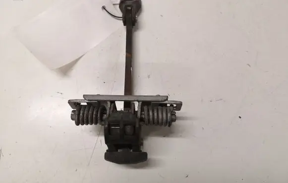 Front door check strap stopper