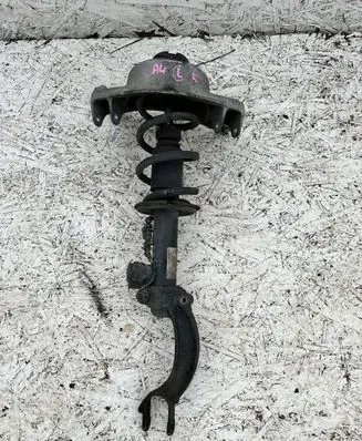 Front shock absorber with coil spring
