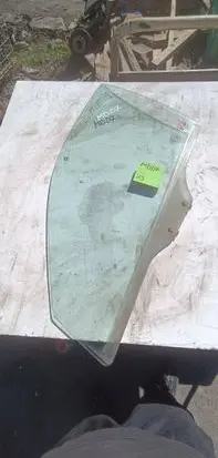 Mazda 626 Front door window glass four-door 1212123