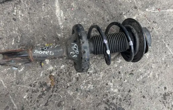 Subaru Legacy Front shock absorber with coil spring