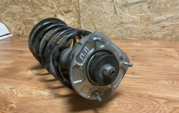 Front shock absorber with coil spring
