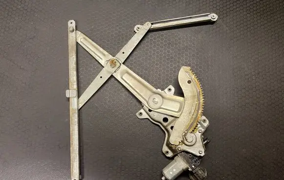 Suzuki Swift I Front door window regulator with motor 8346063J00 2621003380