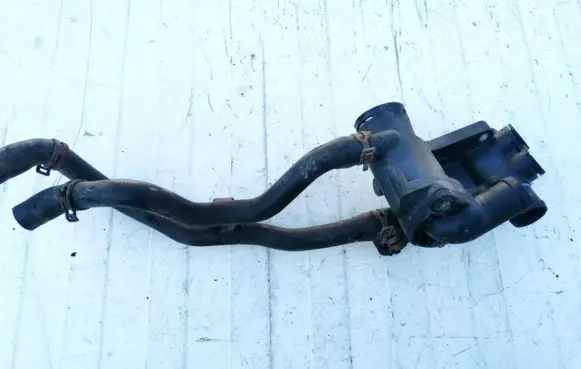 Volkswagen Golf IV Engine coolant pipe/hose 032121111