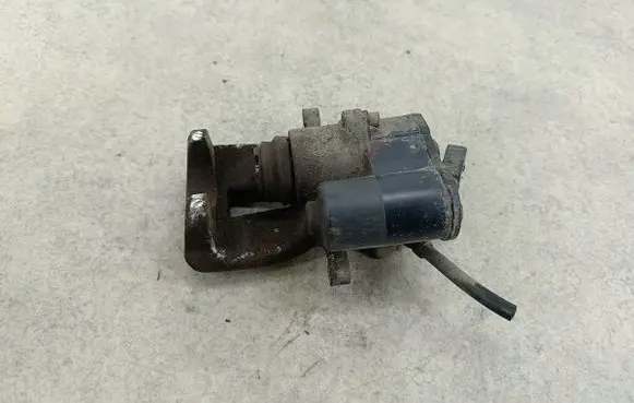 Volkswagen PASSAT B6 Rear brake caliper TRW