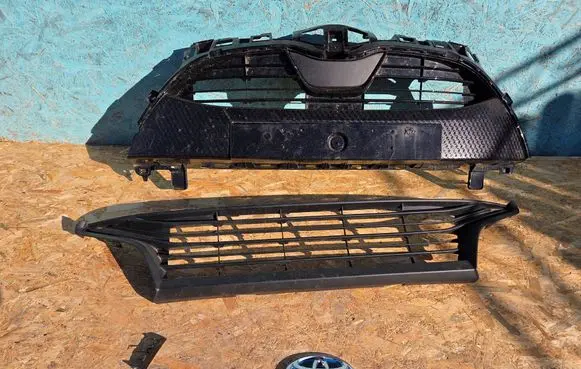 Toyota Yaris XP210 Front bumper upper radiator grill 531010DG60 531110DD70