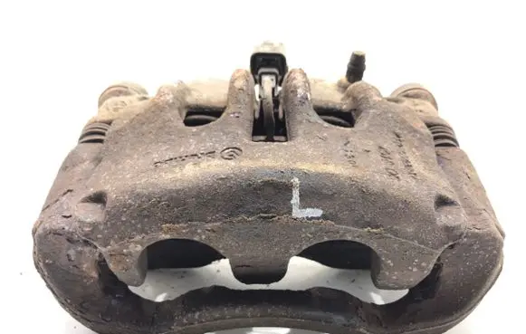Opel Movano B Front brake caliper 