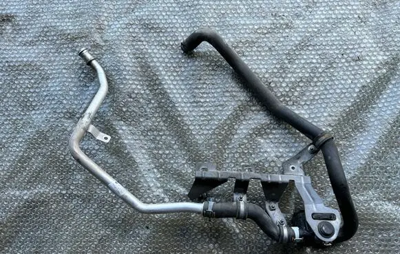 Volkswagen Touareg II Engine coolant pipe/hose 7P0815249 7P0815984TEB 7P0619329TEB