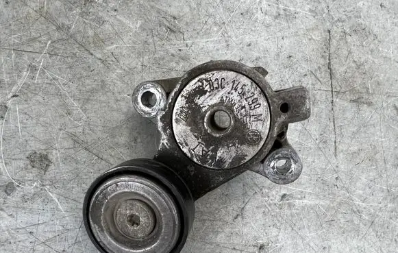Volkswagen Golf Plus Generator/alternator belt tensioner 03C145299M
