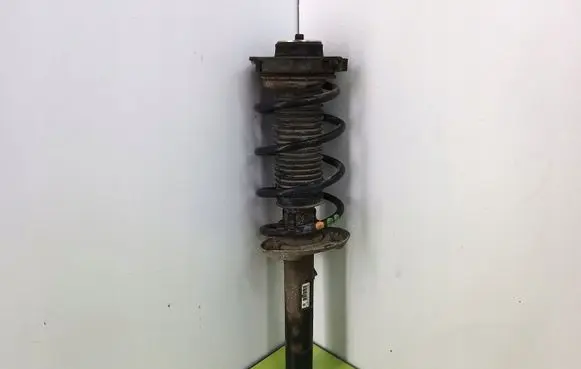 Volkswagen Golf V Front shock absorber with coil spring 1K0413031BE