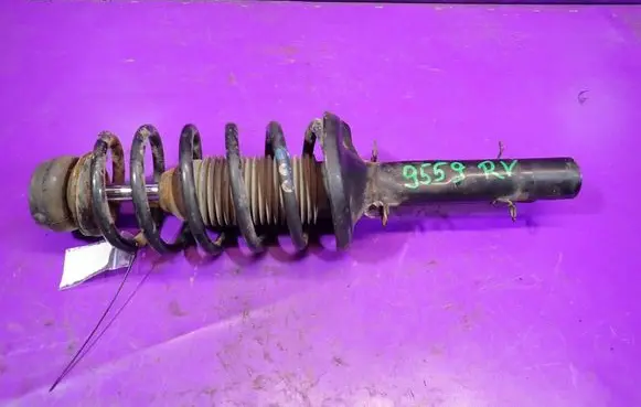 Volkswagen Golf IV Front shock absorber with coil spring 