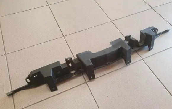 Opel Astra J Front bumper mounting bracket 13264478