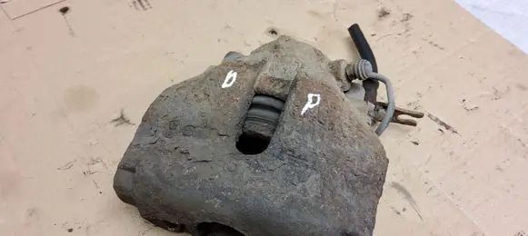 Volkswagen PASSAT B5 Front brake caliper