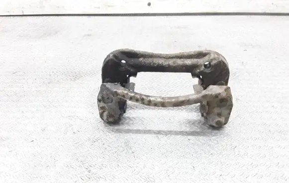 KIA Carens II Brake caliper pad carrier rear 