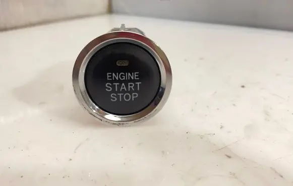 Engine start stop button switch