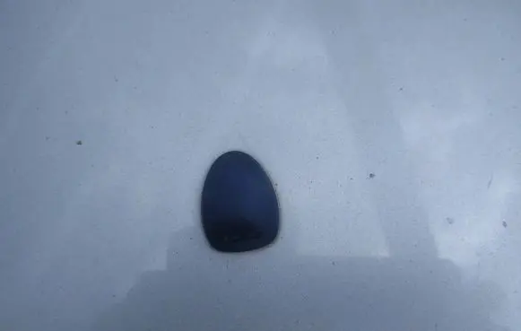 Windshield washer spray nozzle