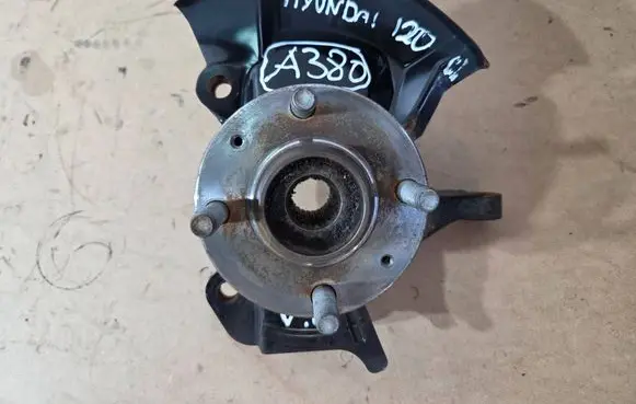 Front wheel hub spindle knuckle