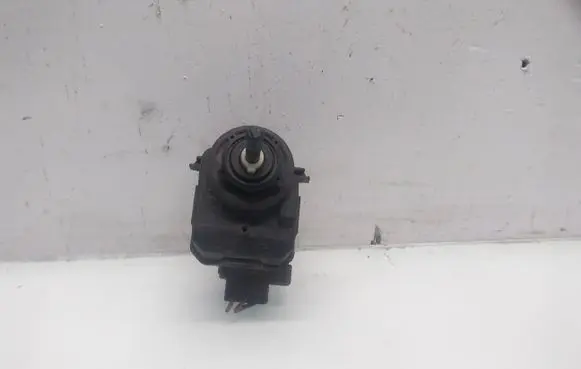 Nissan Almera N16 Headlight level adjustment motor 7700420737