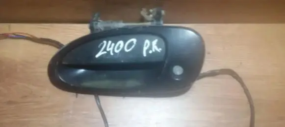 Mazda 323 Front door exterior handle
