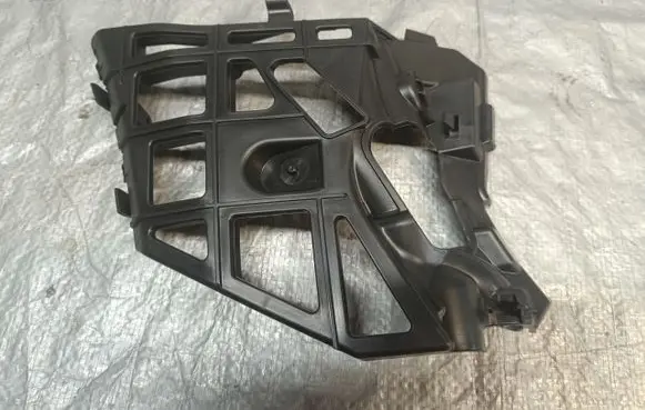 Opel Corsa F Front bumper mounting bracket 9853510280