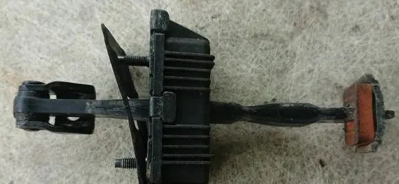 Jaguar XF X250 Rear door check strap stopper