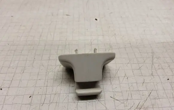 Volkswagen PASSAT B6 Sun visor clip/hook/bracket 1K0857561B