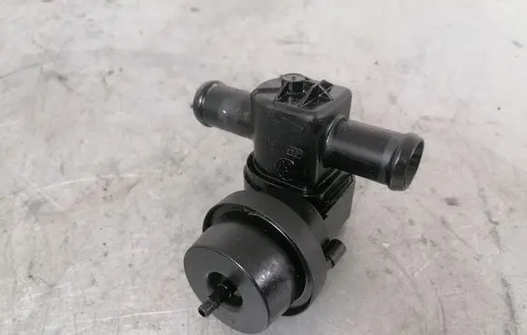 Coolant heater control valve