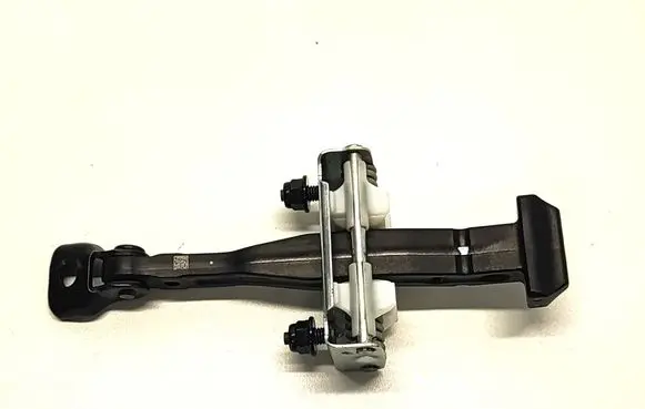 Front door check strap stopper