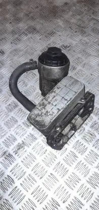 Volkswagen Touareg I Oil filter mounting bracket 070115389B