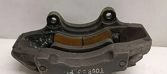 Volkswagen Touareg I Front brake caliper 18ZR