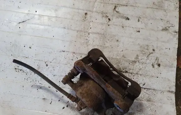 Nissan X-Trail T31 Front brake caliper NOCODE