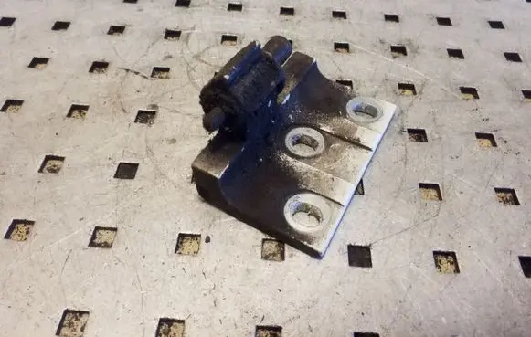 Front door lower hinge