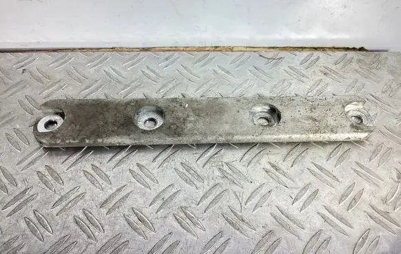 Radiator support slam panel bracket