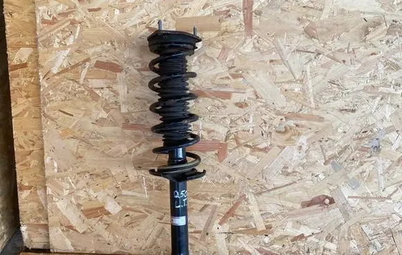 Infiniti Q50 Rear shock absorber with coil spring 562104GE0C